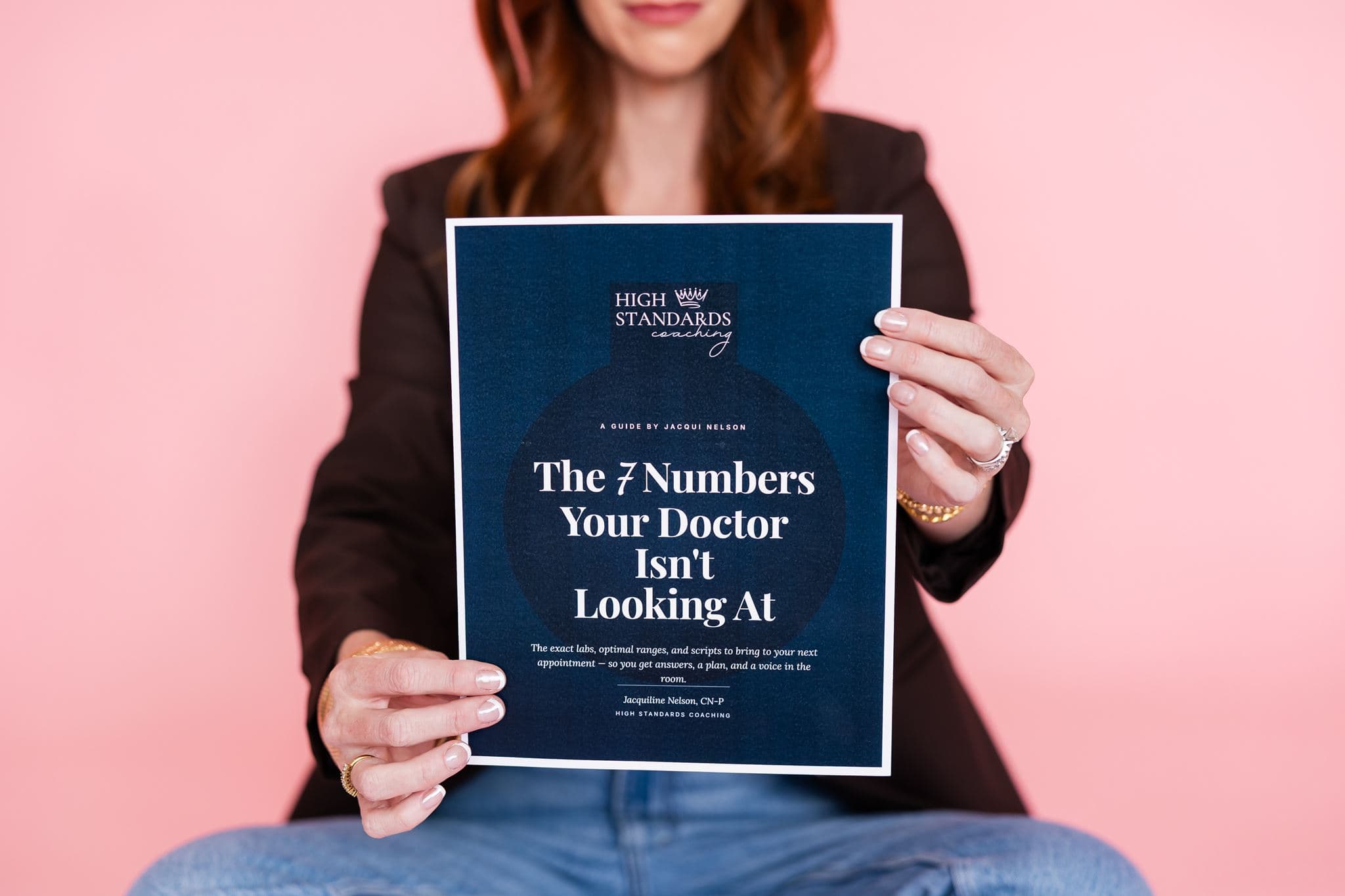 Jacqui holding The 7 Numbers guide